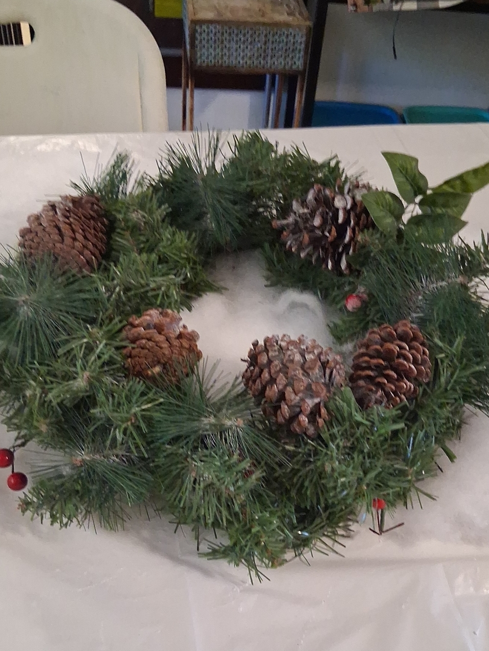Evergreen Pinecone Holiday Wreath with Red Berry Accents